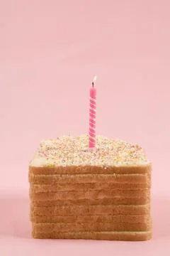 Pink birthday bread Stock Photos