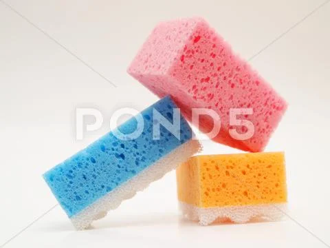 Pink, blue and orange sponge Stock Photos