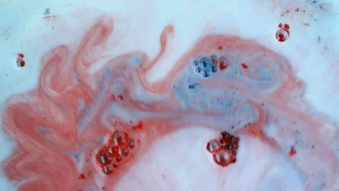 Pink, blue and white paints spread out. Video Stock Footage 123778126