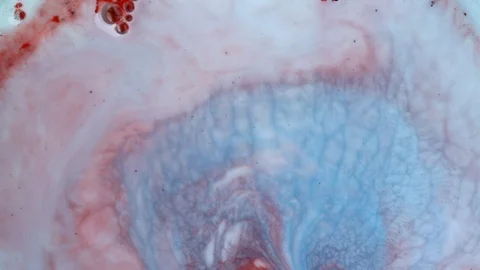 Pink, blue and white paints spread out. Video Stockbeeldmateriaal 123778138
