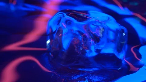 Pink blue ice rotating Stock Footage 106828008