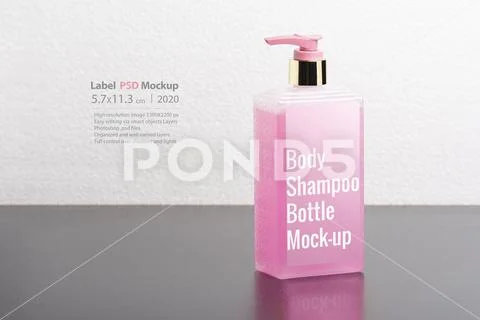 Pink body shampoo bottle in front of  light gray background mock-up serie PSD Template