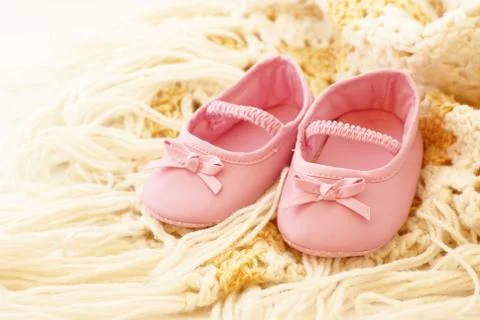 Pink booties Stock Photos