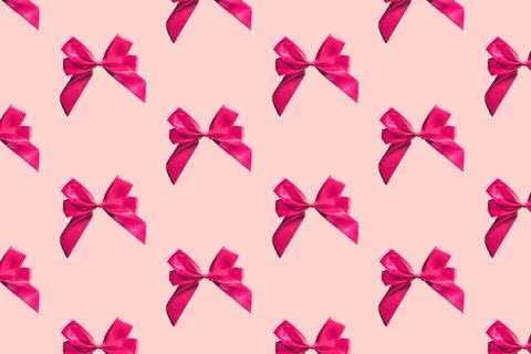 Pink bows pattern on pink background. Gift wrapping Stock Photos