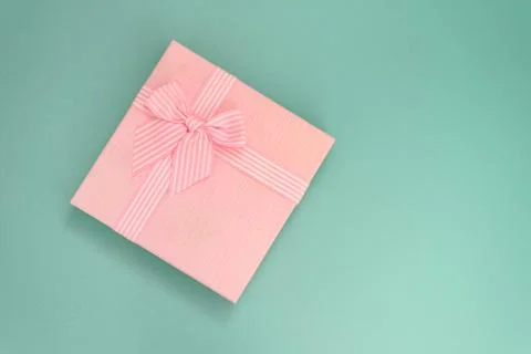 A pink box on the mint background. Stock Photos