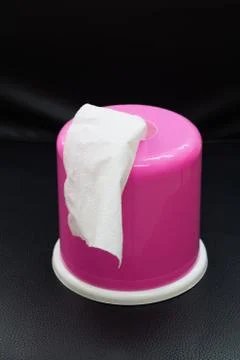 Pink box of tissues  on black background. Stock Photos