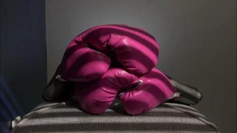 Pink Boxing gloves time lapse, Fighting Breast Cancer Imagery. Survivor, fight. Stock Footage 136923734