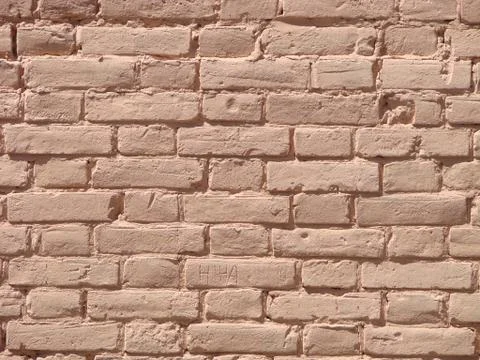 Pink brick wall texture background material of industry building construction Fotos de archivo