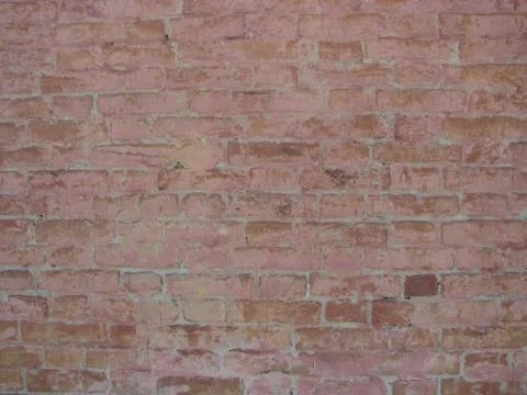 Pink brick wall texture background material of industry building construction Fotos de archivo