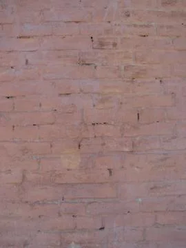 Pink brick wall texture background material of industry building construction Fotos de archivo