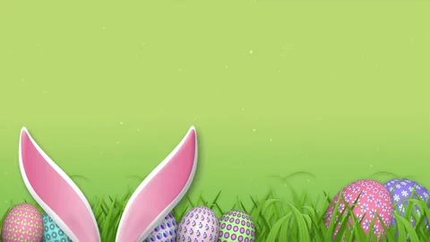 Pink bunny ears, grass and decorated easter eggs on green blur background. Stock Footage 306076729