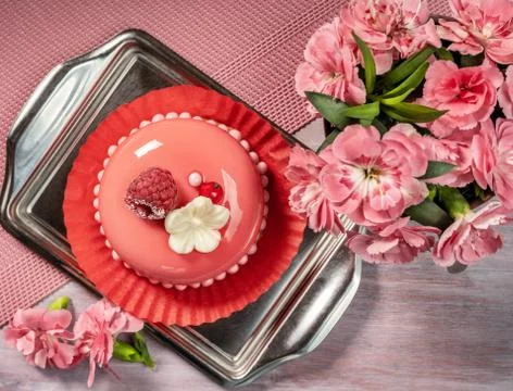 Pink Cake and Carnation Flowers Stock Photos