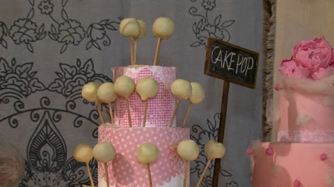 Pink cake pop biscuits vertical pan view 02 Stock-Footage 39381649