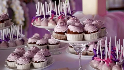 Pink cake pops on a dessert table at party or wedding celebration. Video stock 105429376