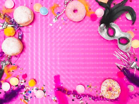 Pink carnival effect background with various carnival utensils Stock Photos