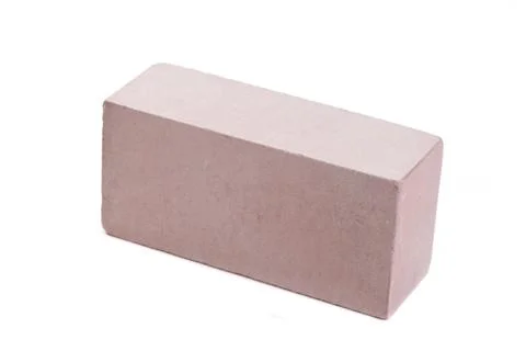 Pink ceramic brick at the white background, isolated Stock Photos