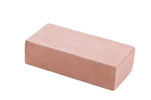 Pink ceramic brick at the white background, isolated Stock Photos