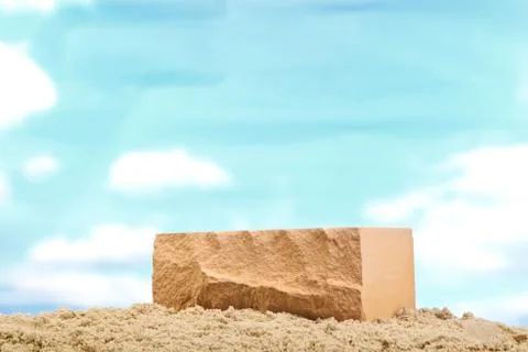 Pink ceramic bricks on the sand at the blue sky background Stock Photos