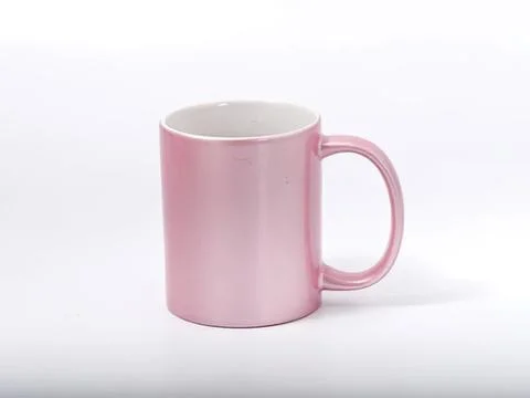 Pink ceramic mug on white background for coffee or tea Stock Photos
