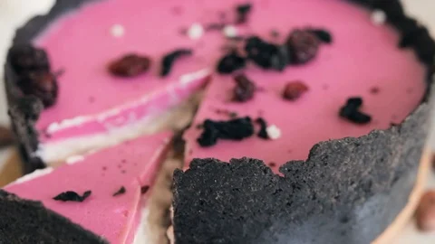 Pink cheesecake with dried berries. Camera movement Stock Footage 129233947