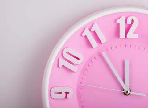 Pink clock face closeup Stock Photos