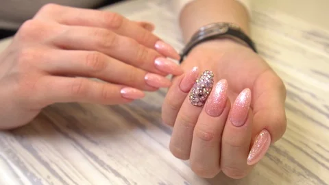 With pink Close Up View, slow motion Female hands manicure close up view Stock-Footage 122646134