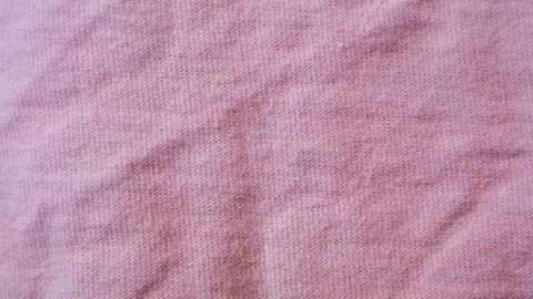 Pink cloth texture as background Stock Photos