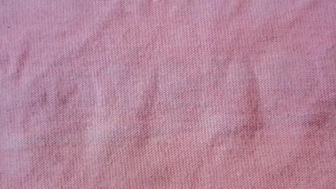 Pink cloth texture as background Stock Photos