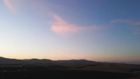 Pink Cloud during Sunset on California Mountain Range facing West Video stock 144196807