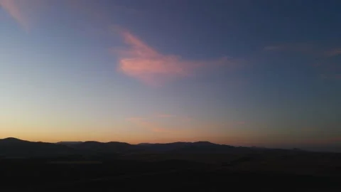 Pink Cloud during Sunset on California Mountain Range facing West Video stock 144198737
