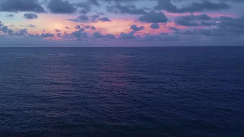 Pink Clouds and Blue Ocean at Sunset. Aerial Drone View Stock Footage 314864964