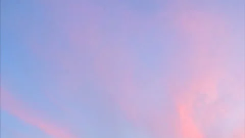 Pink clouds in the blue evening sky timelapse Stock Footage 87229891