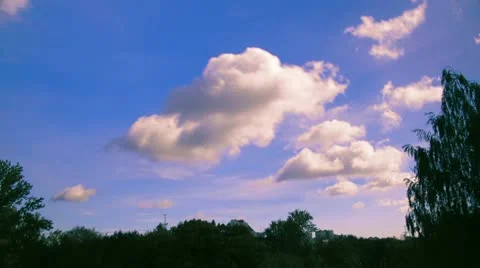 Pink clouds on blue sky time lapse t3325D Stock Footage 11525995