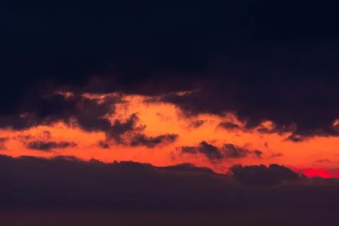 Pink clouds close up at sunset in the evening Stock Photos