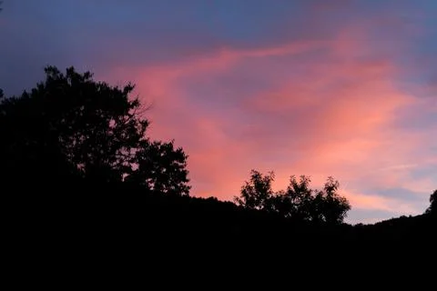 Pink clouds during a sunset Stock Photos