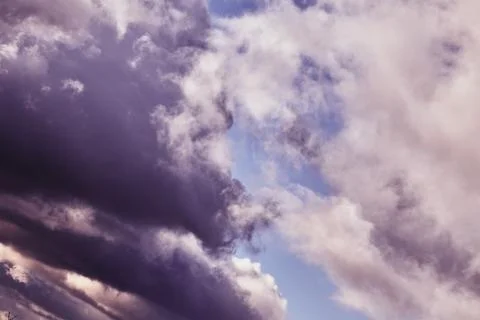 Pink clouds in the evening sky Stock Photos