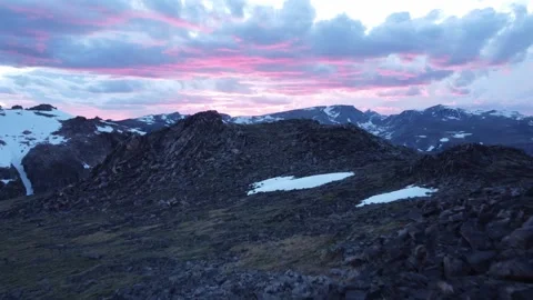 Pink clouds over high mountain landscape Stock-Footage 312032941