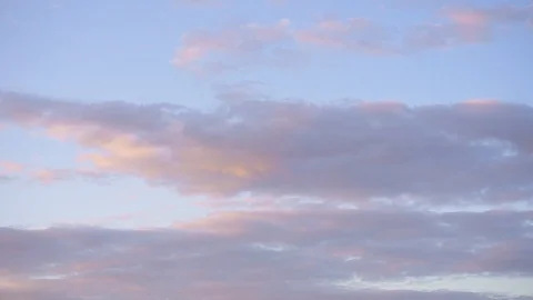Pink clouds from the setting sun in the sky Stock Footage 96181003
