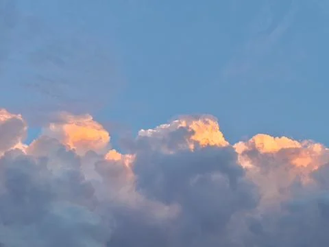 Pink clouds in the sky, beautiful sunset photo Stock Photos