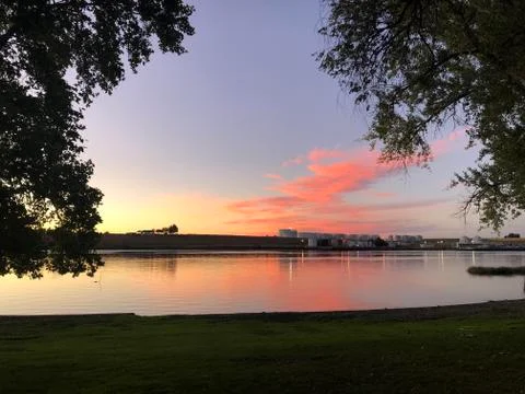 Pink clouds at sunset over snake river Stock Photos
