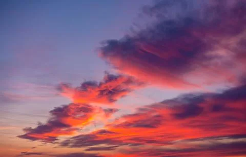 Pink clouds at a sunset Stock Photos