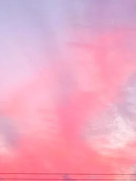Pink clouds at sunset Stock Photos