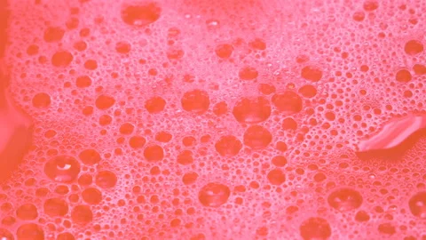 Pink cocktail with bubbles background, cold fresh lemonade drink Stock Footage 157650619