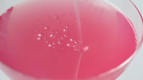 Pink cocktail  with bubbles, macro Stock Footage 168700820