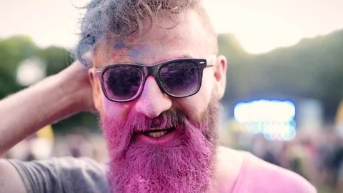 Pink color on the face of man  Stock Footage 77380528