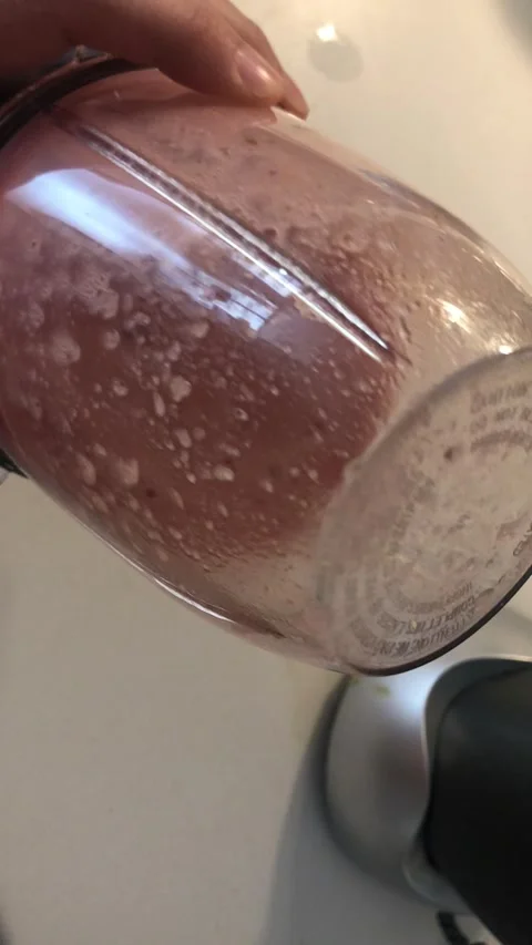 Pink-Colored Beverage Close-Up Inside Blender Container Food Texture Background Stock Footage 331944633