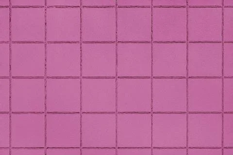 Pink colored ceramic tile texture, background with square geometric pattern.. Stock Photos