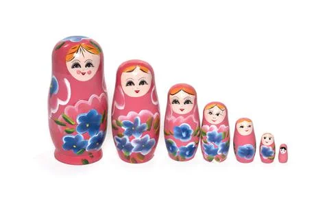 Pink colored nesting dolls on a white background. Russian national souvenir. Foto stock