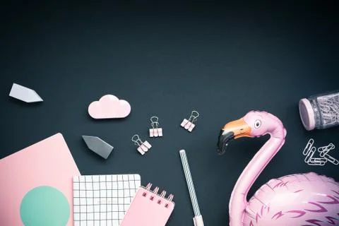 Pink colored objects on black background, top view Stock Photos