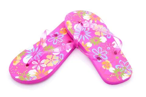 Pink colored summer slippers Stock Photos